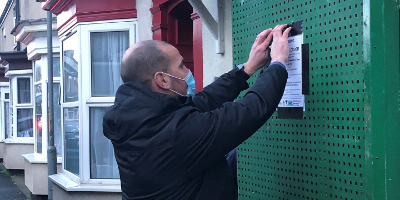 Image of closure warning sign being put up 