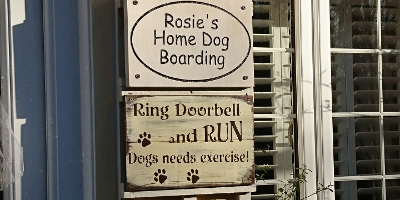 Image of Rosie's home dog boarding plaques