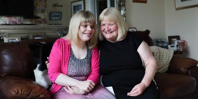 Two women together on the sofa