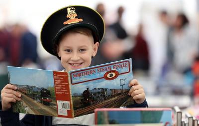 Young boy enjoying the Stockton and Darlington Railway Specialist Market on Stockton High Street 