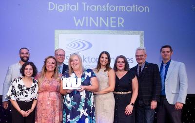 An image of Council staff being presented with the 'Digital Transformation' award