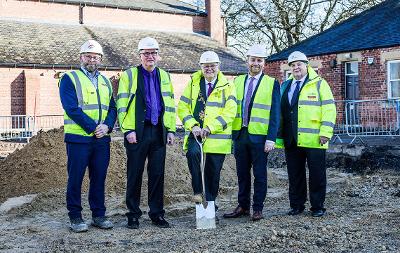 Groundbreaking ceremony at Preston Park to mark the works of the new extension and storage building beginning including councillors, contractors and the local MP.